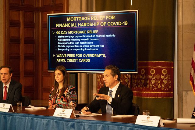 A photograph of Governor Andrew Cuomo at a press briefing March 19th.